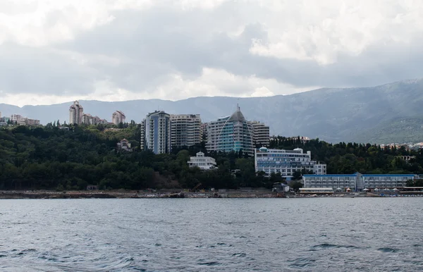 New holiday homes on the Black Sea coast of the South Coast and the background mountains, Crimea, Ukraine