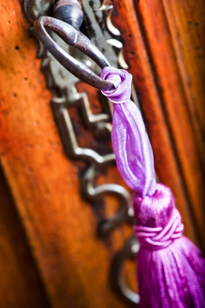 Old wooden cupboard with its old key — Stock Photo #35132221