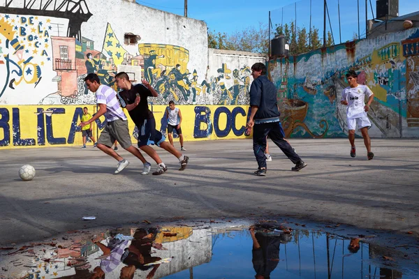BUENOS AIRES MAY 01: Soccer players in the Caminito street in th
