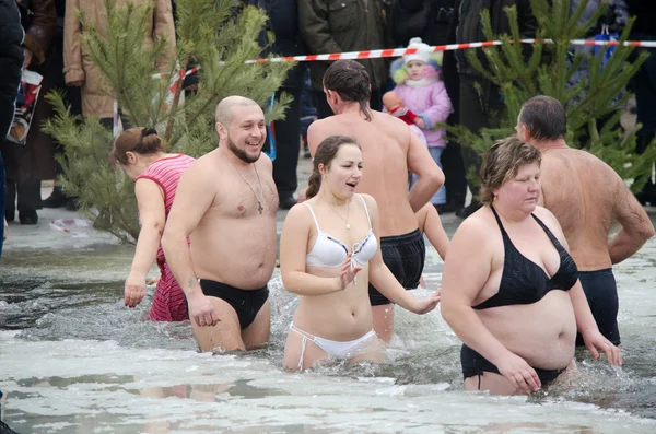 People bathe in the river in winter . Christian religious festival Epiphany