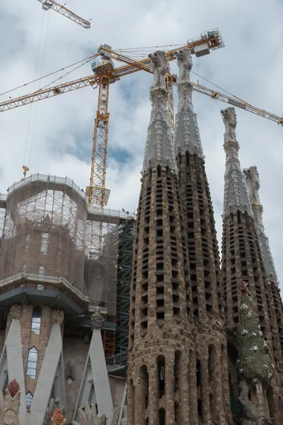 The cranes over Sagrada Familia towers in Barcelona, Catalonia,