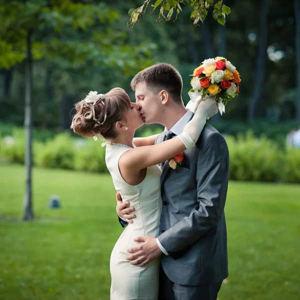 Couple kissing on the wedding day