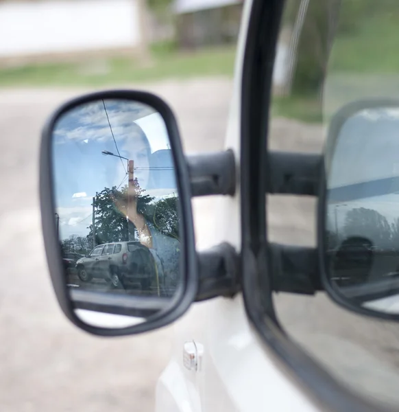 Driver is reflected in mirror