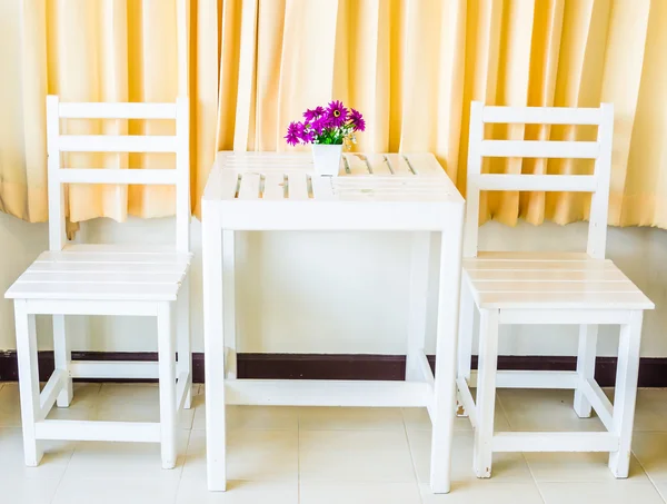 White wood table and chairs