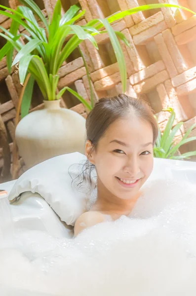 Women spa bath in jacuzzi