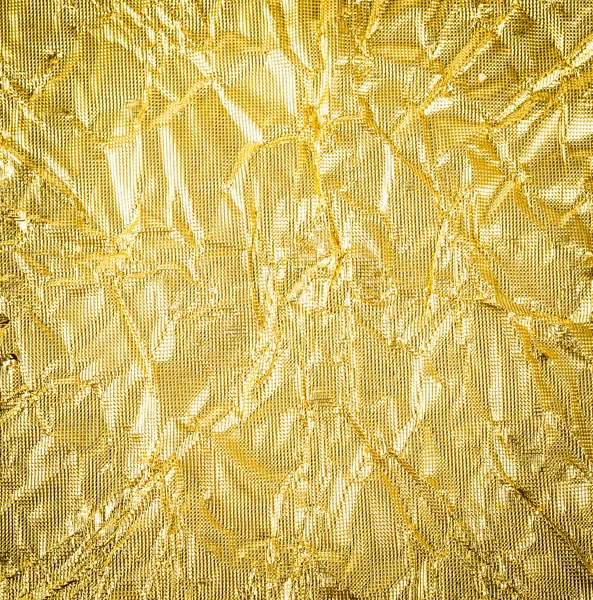 Gold paper crumpled texture background