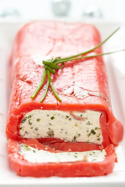 Cheese terrine wrapped with smoked salmon