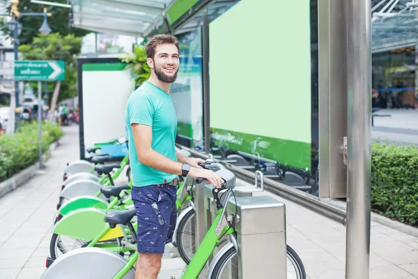 Man taking motorbike for rent