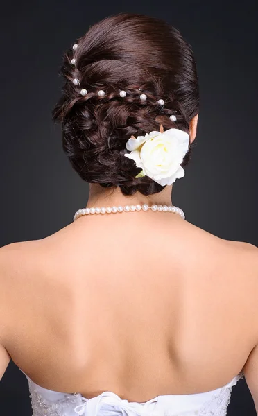 Closeup of brunette bride hairstyle in studio