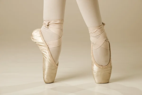 Ballet dancer feet - gold