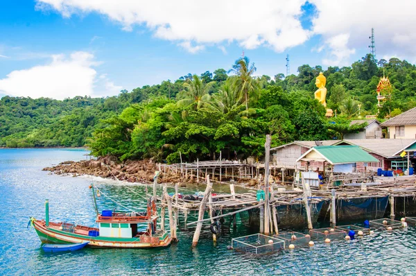 Koh Kood Island, Thailand - May 26, 2014: View of Baan Ao Salad port and fishing village on Koh Kood Island, Thailand