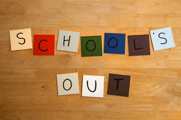 SCHOOLS OUT sign for Educational, Editorial, Teaching, Students.