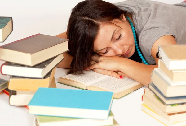 Bookworm sleeps on books — Stock Photo #17215661