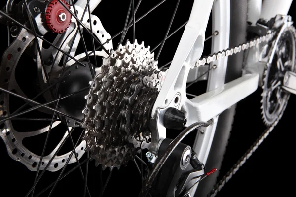 Bicycle gears, disc brake and rear derailleur.