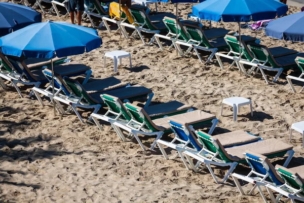 Deck chairs over the sand in a idyllic beach in Ibiza, Balearic