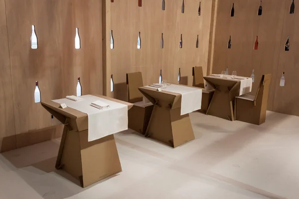 Restaurant with cardboard tables and chairs at HOMI, home international show in Milan, Italy