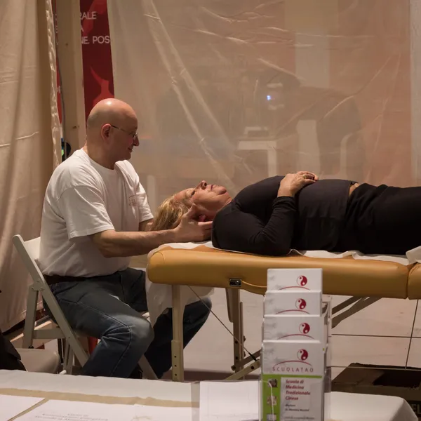 Professional masseur at Olis Festival in Milan, Italy