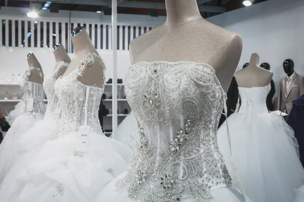 Wedding dresses on display at Si' Sposaitalia in Milan, Italy