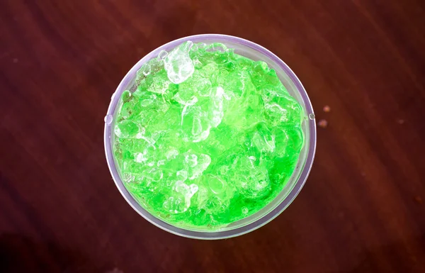 Green fruit flavor soft drinks whit soda water