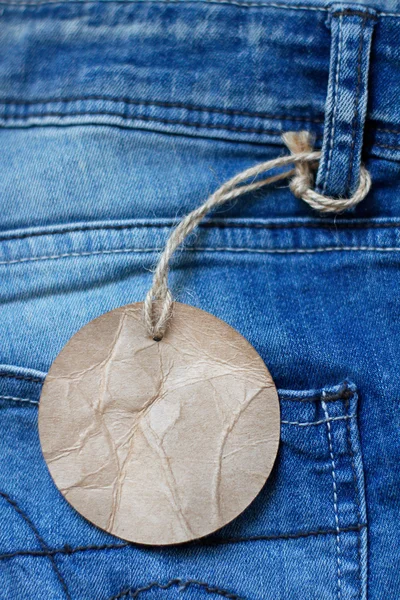 Jeans with blank paper label tag
