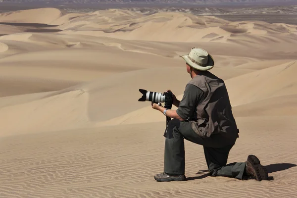 Tourist with camera - Namib Desert - Namibia