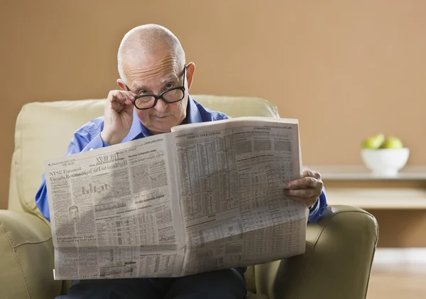 Elderly Man Reading Newspaper — Stock Photo #18773783