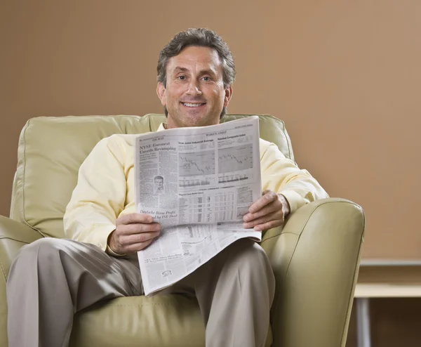 Man Reading Newspaper