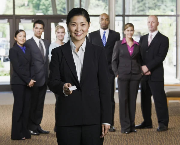 Businesswoman Offering Business Card