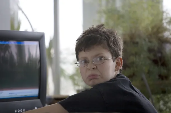 Middle School Boy Using a Computer