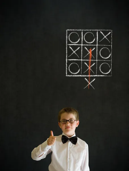 Thumbs up boy business man with thinking out of the box tic tac toe concept