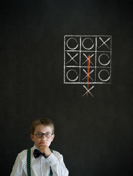 Thinking boy business man with thinking out of the box tic tac toe concept