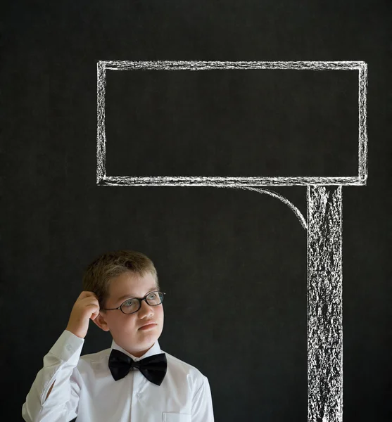 Scratching head thinking boy business man with chalk road advertising sign — Stock Photo #25842379
