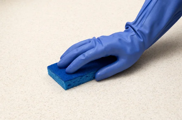 Rubber Gloved Hand With Sponge