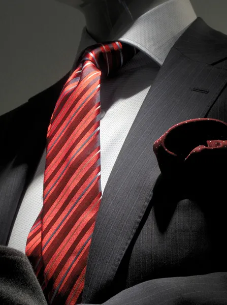 Striped grey jacket with red striped tie and handkerchief (verti