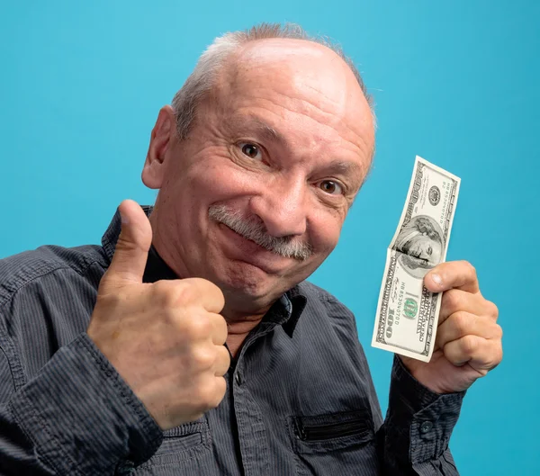 Lucky old man holding dollar bills