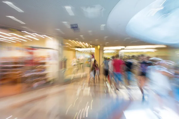 People silhouettes at shopping mall