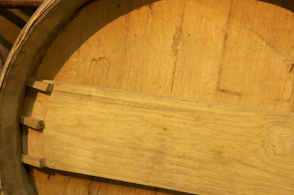 Wine barrel detail in an aging process