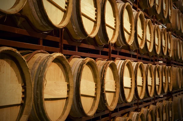 Wine barrels in an aging process