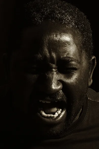 Man yelling (black and white photo)