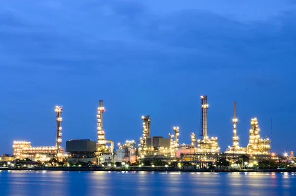 Petrochemical oil refinery factory pipeline in dusk