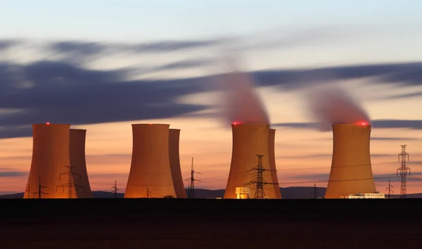 Nuclear power plant by sunset