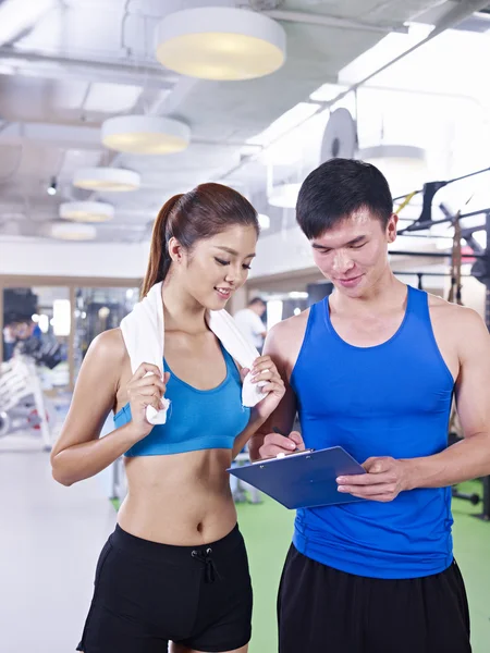 Young woman and her trainer