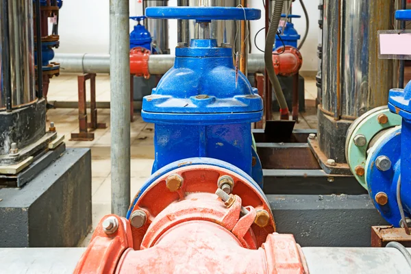 Pressure pump for running water in a building