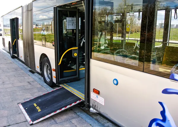 Access ramp for disabled persons and babies in a bus