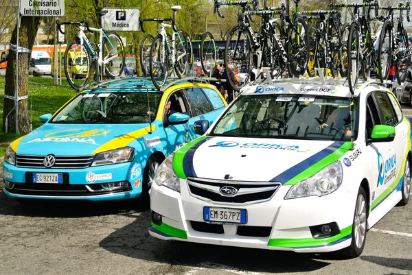 Two team cars in the Tour of Basque Country