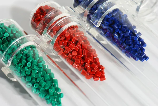 Dyed polymer resin in test-tubes in labortory