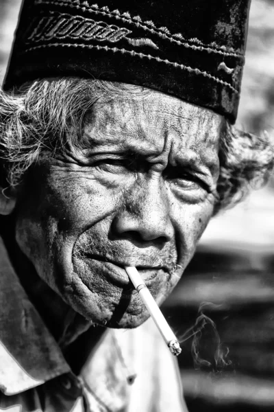 Old man smoking