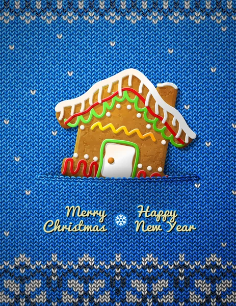 Christmas house cookie on knitted background