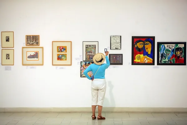 Paintings in an exhibition