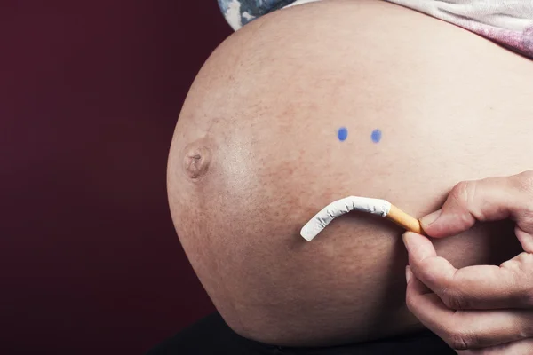 Pregnan and cigarette